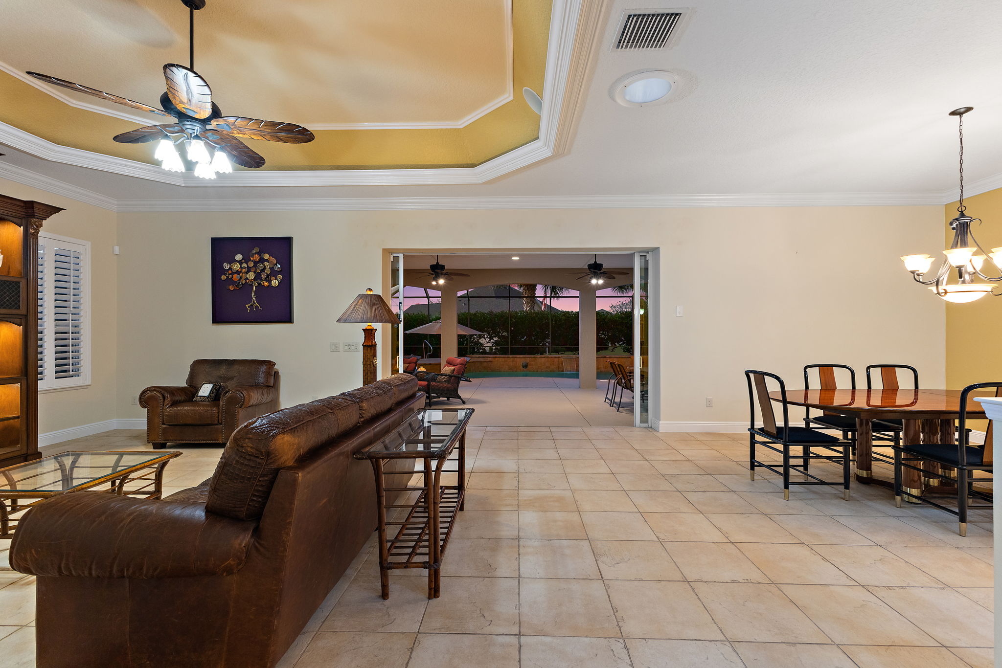 Twilight Living and Dining Rooms with Pool and Spa Views
