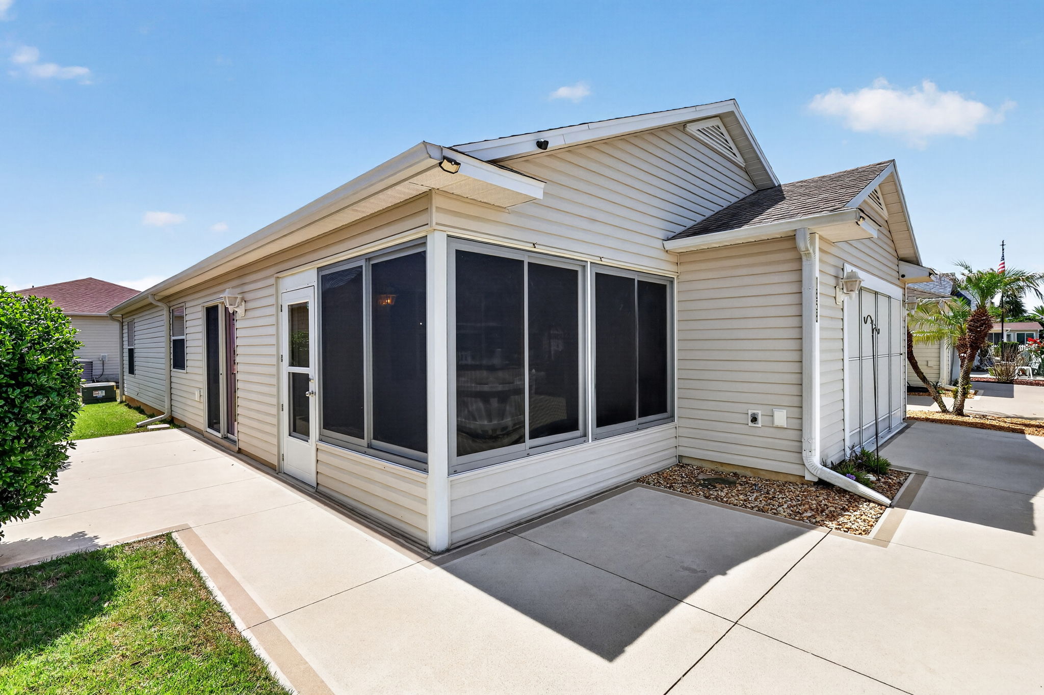 Front Elevation with Spacious Front and Side Patiops