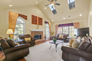 Family Room with Vaulted Ceiling and Skylights