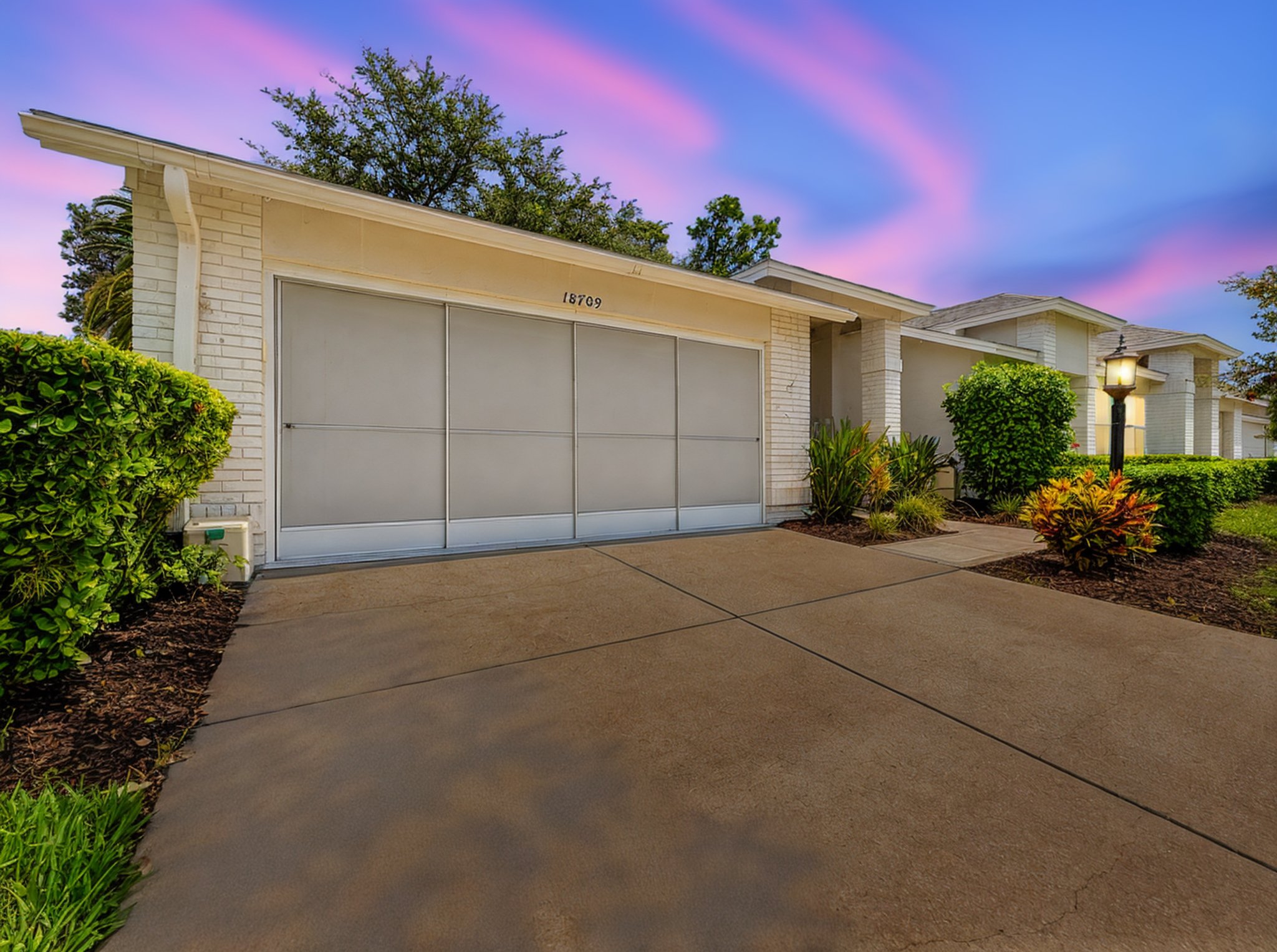 Sunny Suburban Home with Garage 18709 day to dusk.jpeg