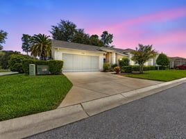 Sunny Suburban Home with Tropical Landscaping day to dusk.jpeg