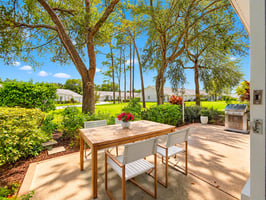 Sunlit Suburban Patio Garden View virtually staged.jpeg