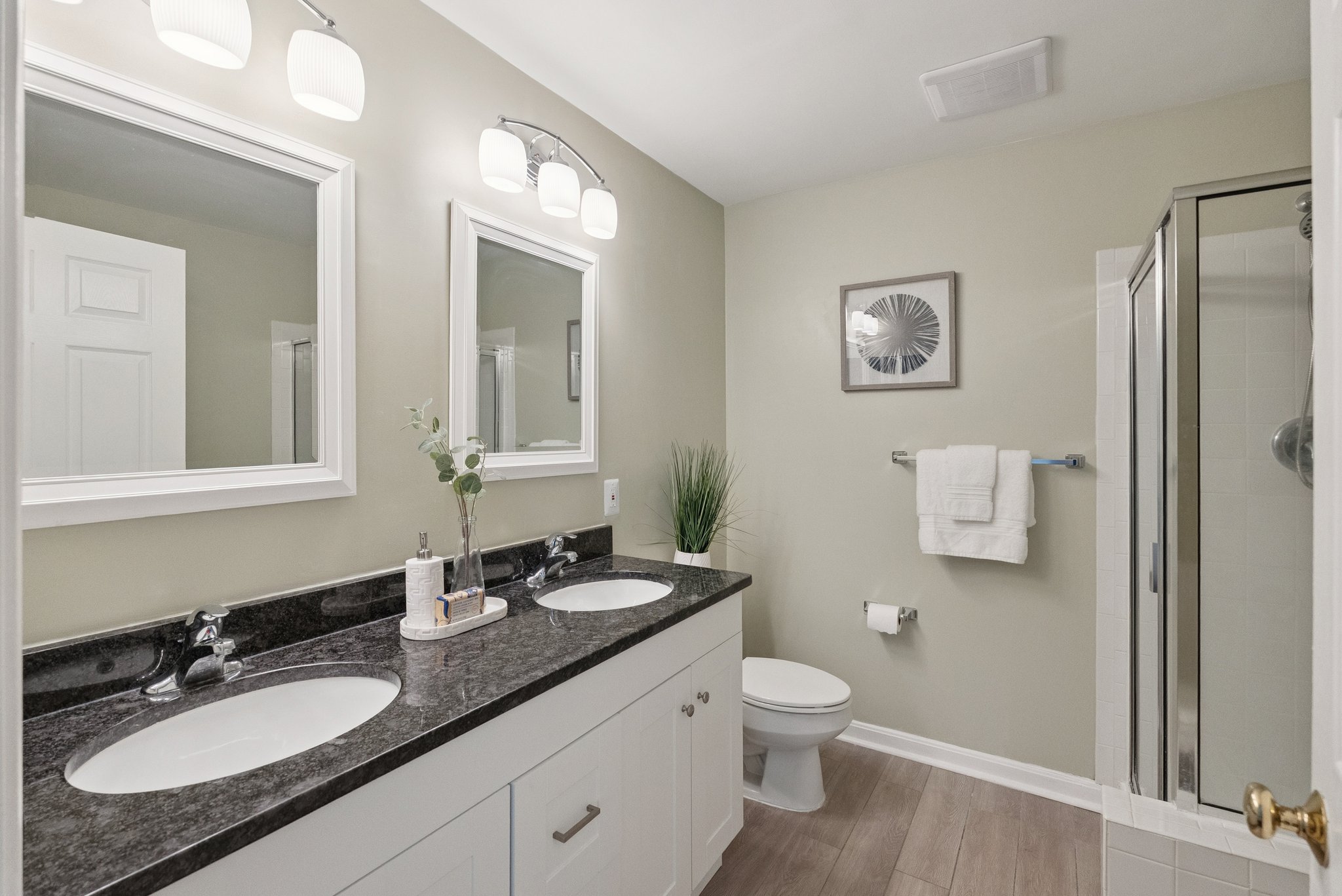 Primary Bathroom with Dual Vanities & Soaking Tub