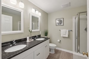 Primary Bathroom with Dual Vanities & Soaking Tub