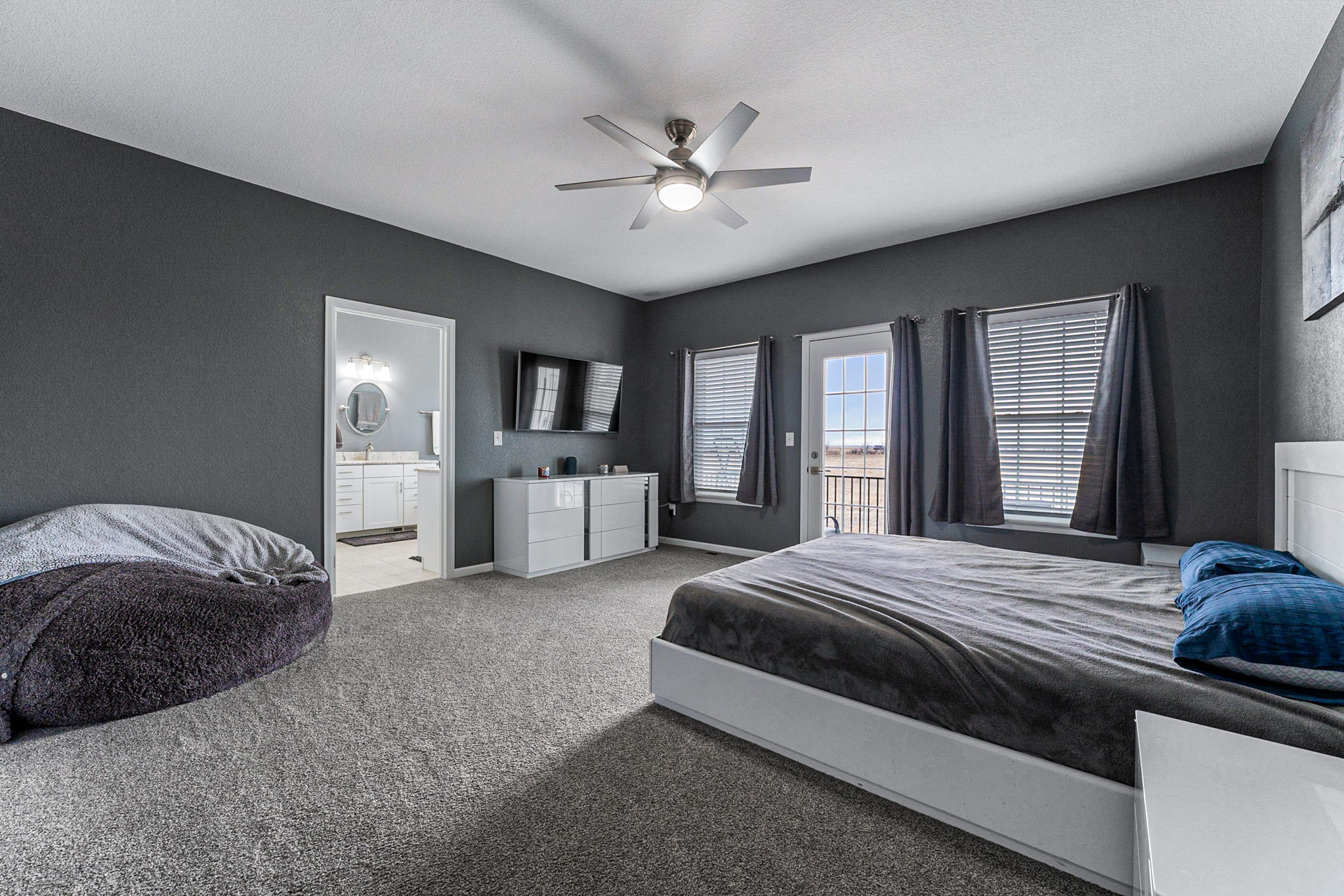 Large open primary with access to your private deck