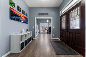 Front entry opens up to the office