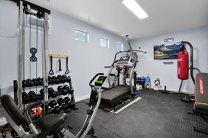 3rd car garage bay has AC home gym