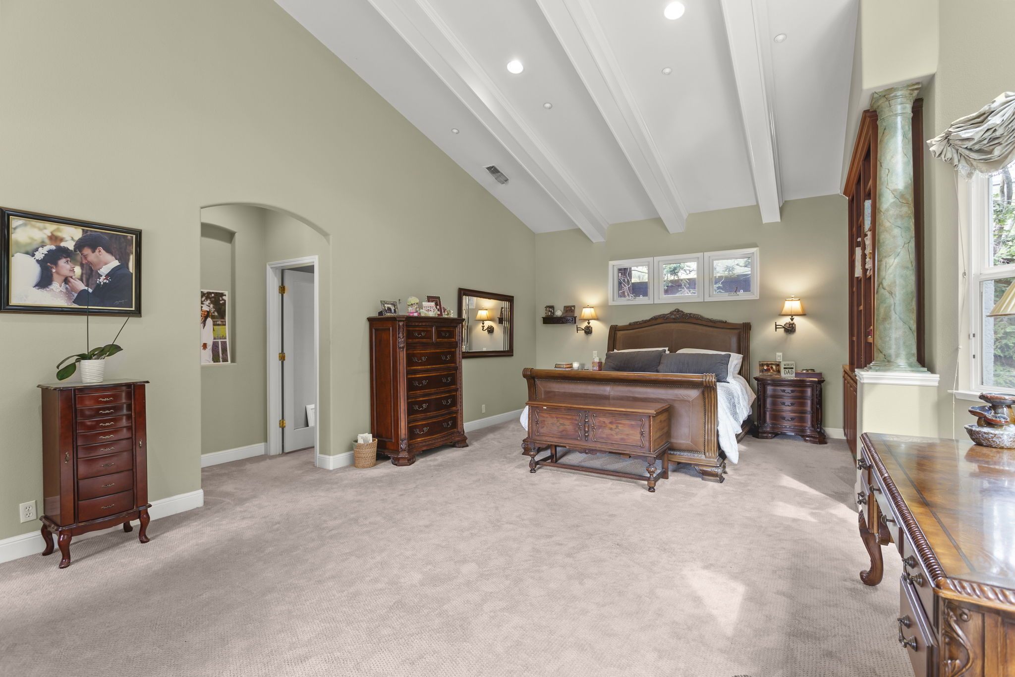 Huge primary/master bedroom suite with entry to private bath suite and massive master closet