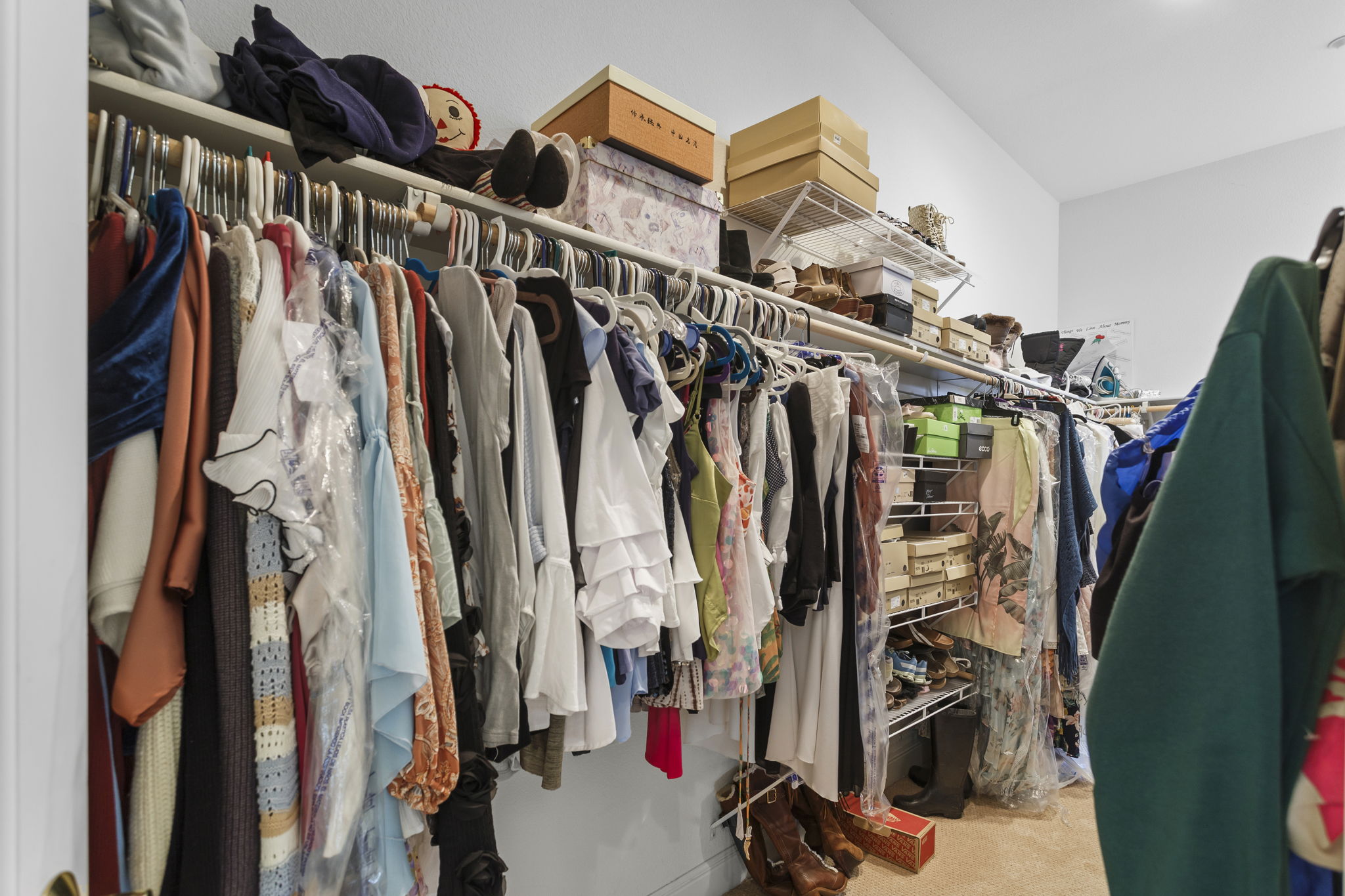 Huge, deep primary master bedroom closet