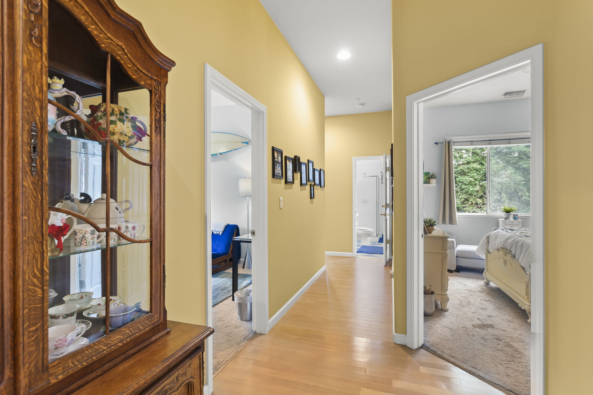 Hallway to main bedrooms with BR#3 on right, secondary master BR suite on left