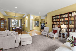 View from living room toward (left to right) dining room, entry, den/office