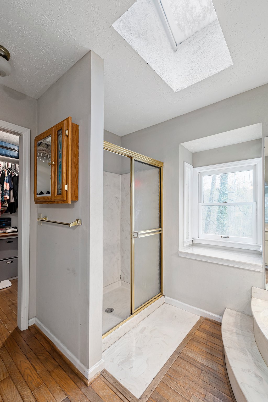 Separate shower and more skylights!