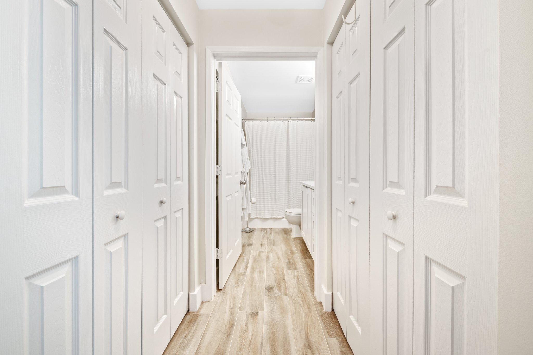 Two closets on the way to the bathroom