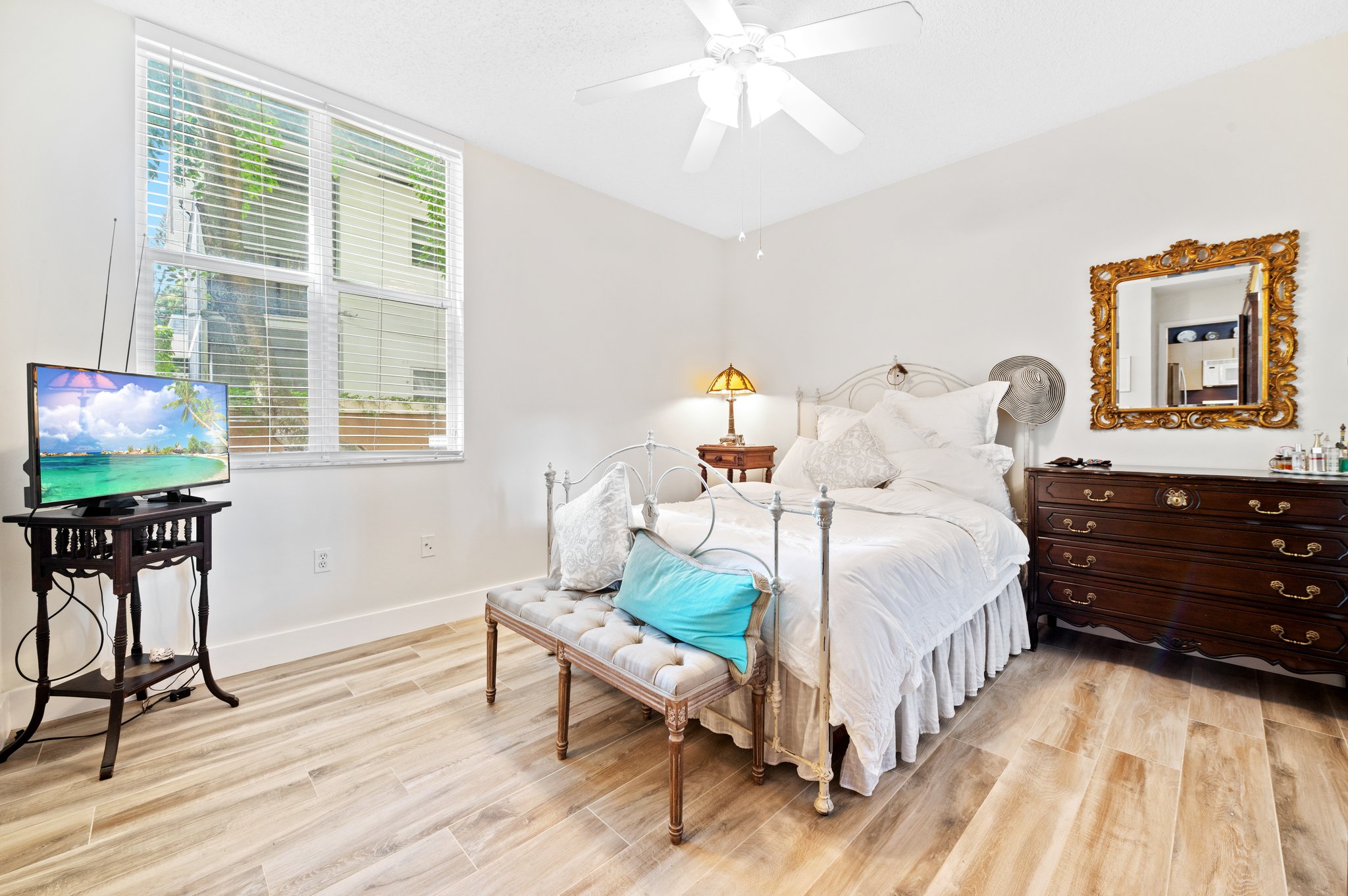 Owner's suite...high ceilings...upgraded tile flooring & baseboards