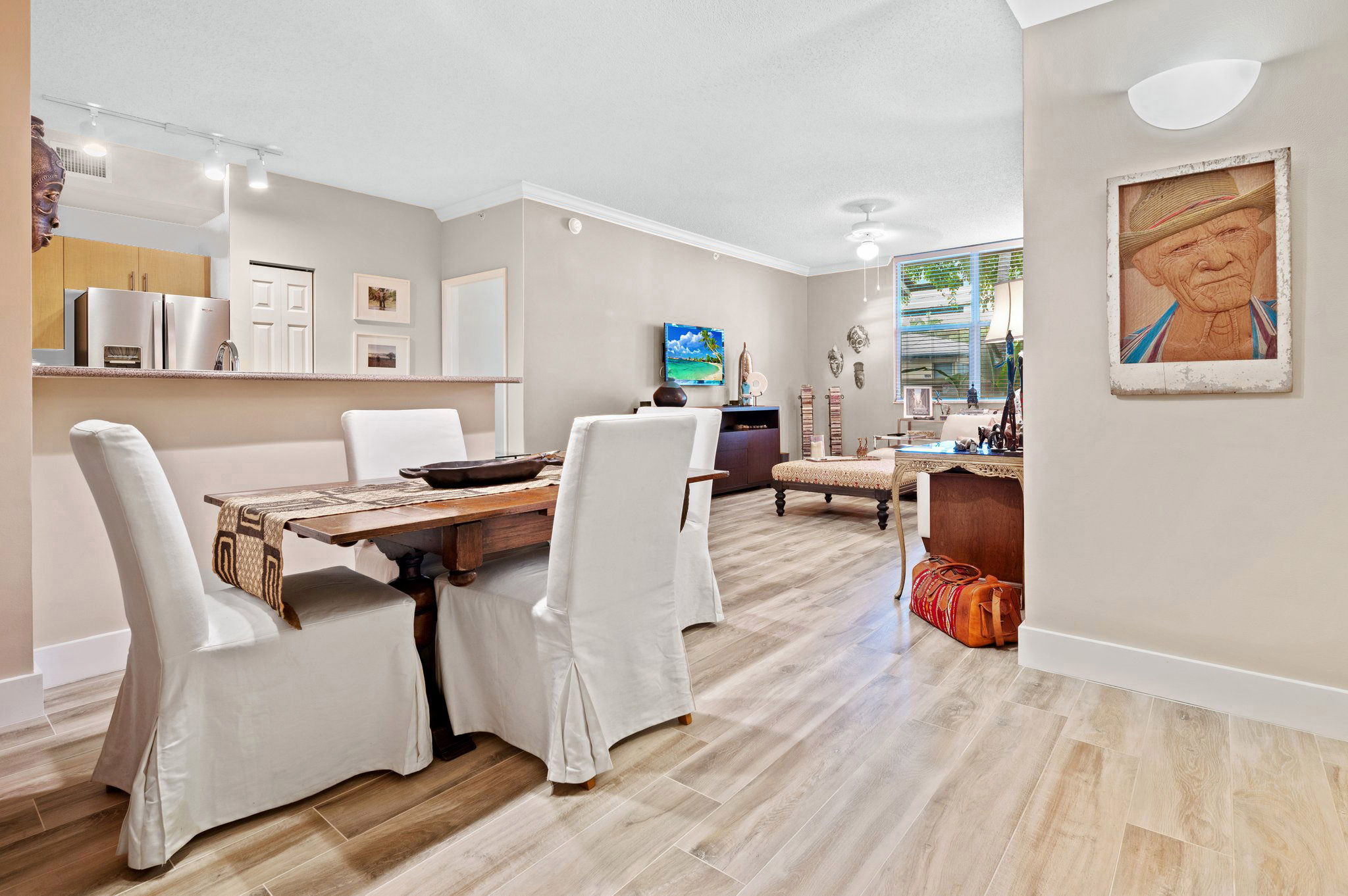 Open Floor Plan...Updated neutral wood pland tile flooring...