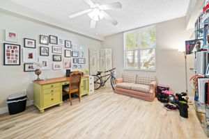 Bedroom #2 with upgraded tile flooring & walk-in closet