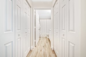Two closets on the way to the bathroom
