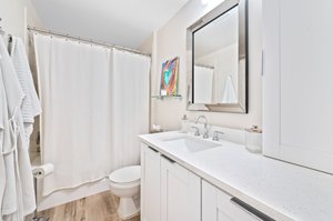 Upgraded bath, flooring & quartz vanity