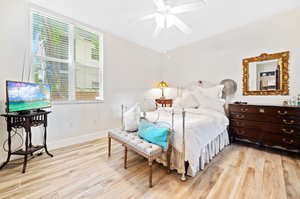 Owner's suite...high ceilings...upgraded tile flooring & baseboards