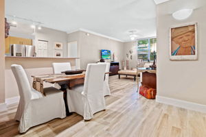 Open Floor Plan...Updated neutral wood pland tile flooring...