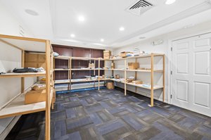 Electronic entry package delivery/dropoff room in building 1900