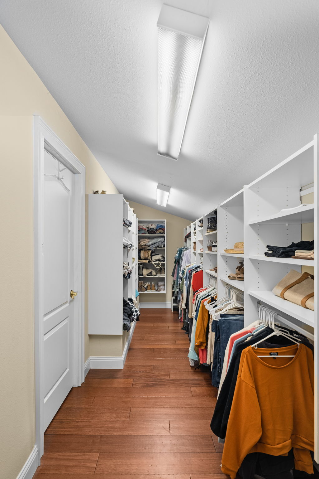 Primary Bedroom Walk-in Closet - Upper