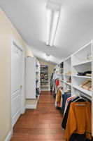 Primary Bedroom Walk-in Closet - Upper