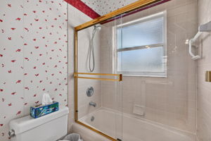 POCKET DOOR SEPERATES THIS SPACE FROM THE DUAL SINKS