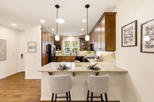 Kitchen Island. Quartz countertops and bar seating offer a casual spot for quick meals or conversation.