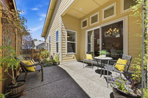 Patio. A private outdoor sitting area with bistro seating, perfect for morning coffee or evening relaxation.