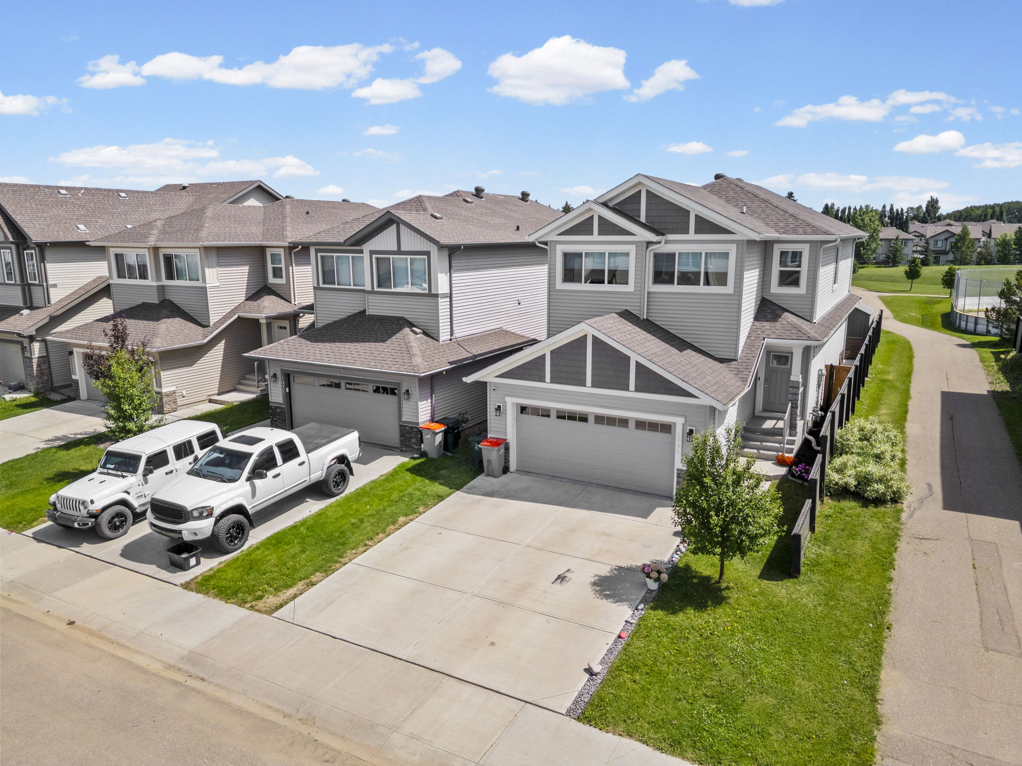 Oblique aerial view of the Westerra Lane home and neighbouring driveways.