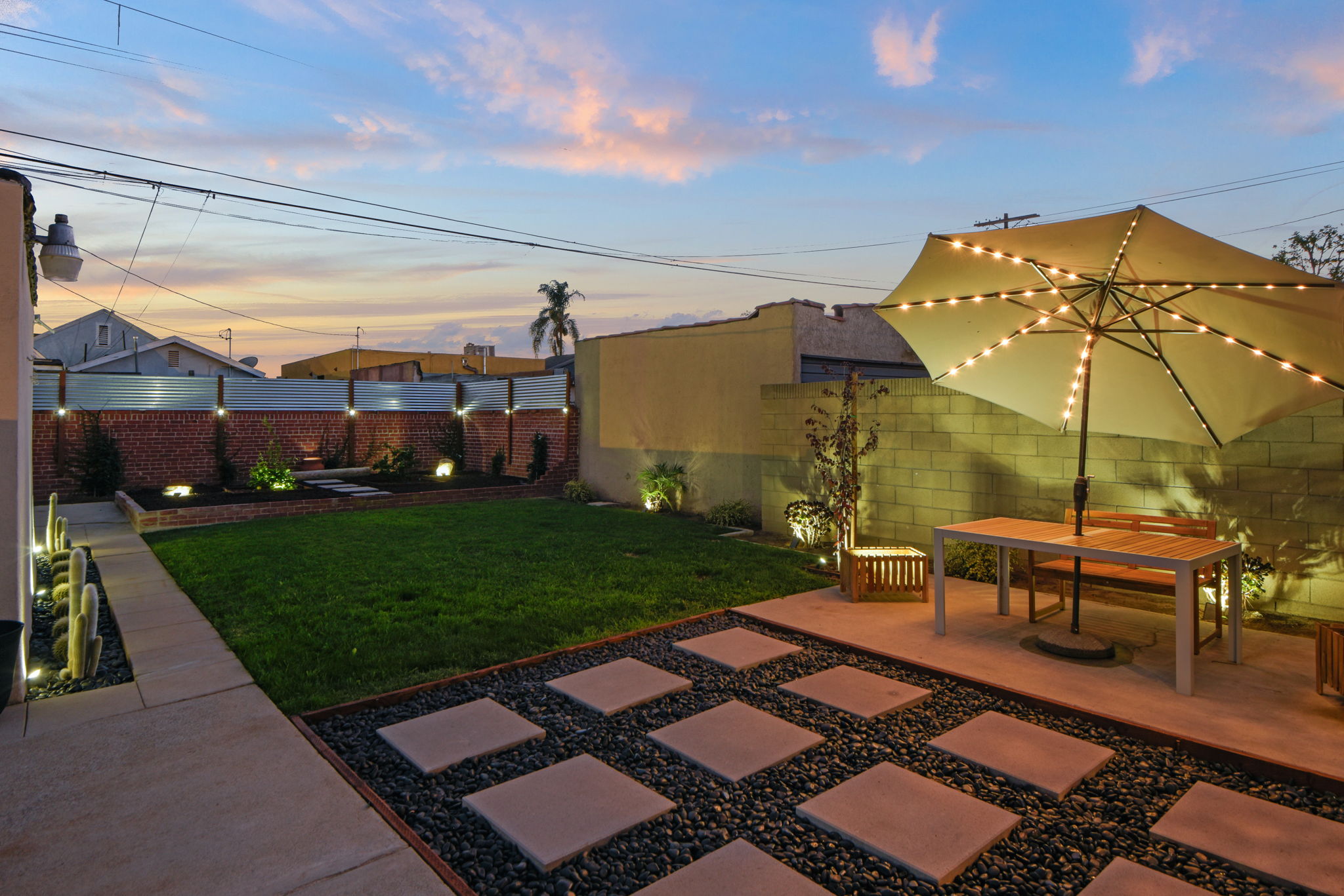 Private Back Yard, 2 Lemon & 2 Plum Trees, Catcus Plants.
