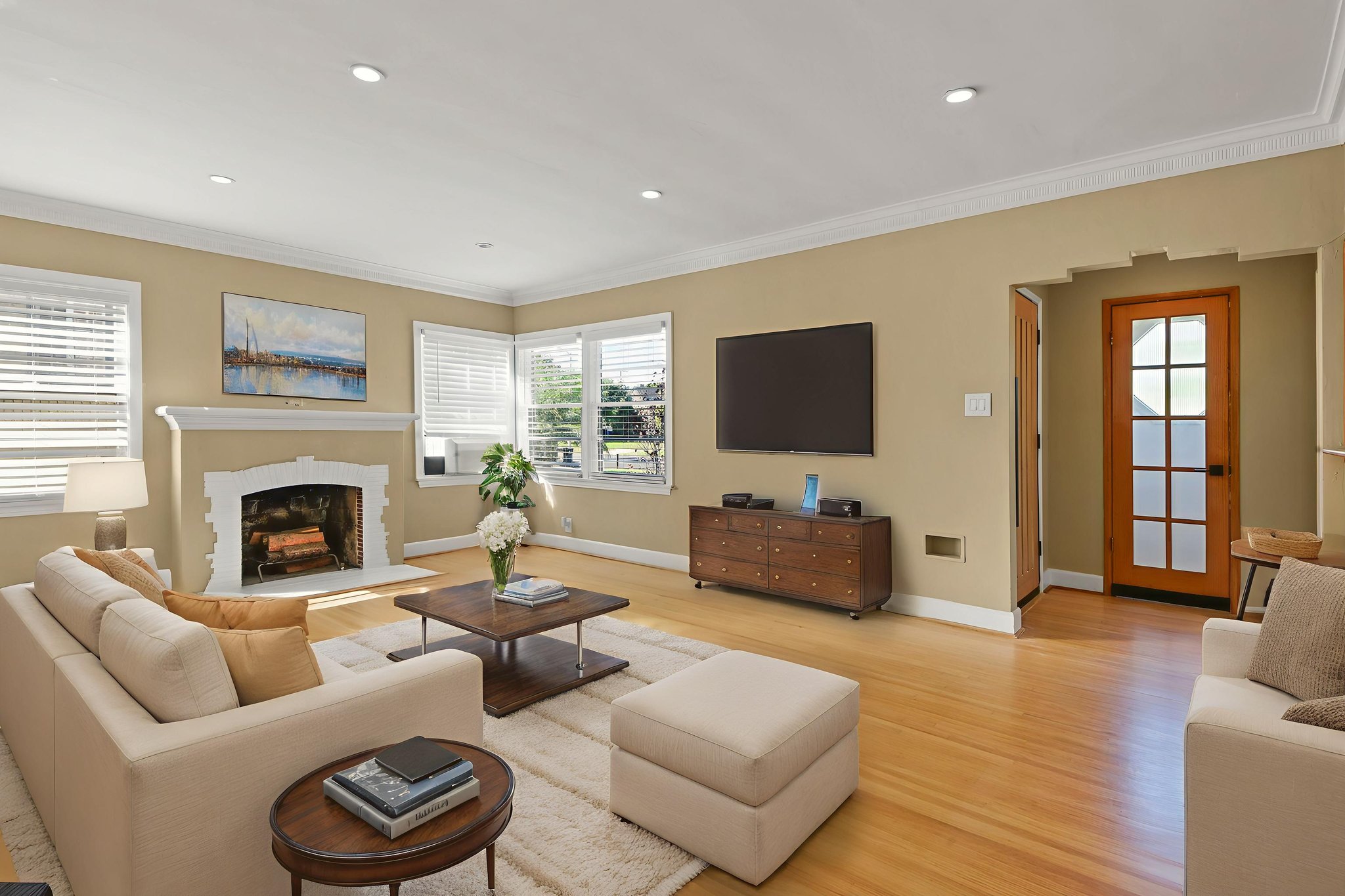 Living Room & Wood Burning Fireplace virtually staged.jpeg