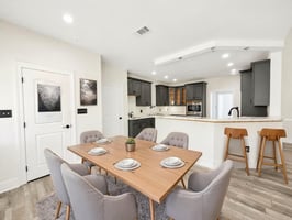 25-kitchen-and-dining-open virtually staged.jpeg