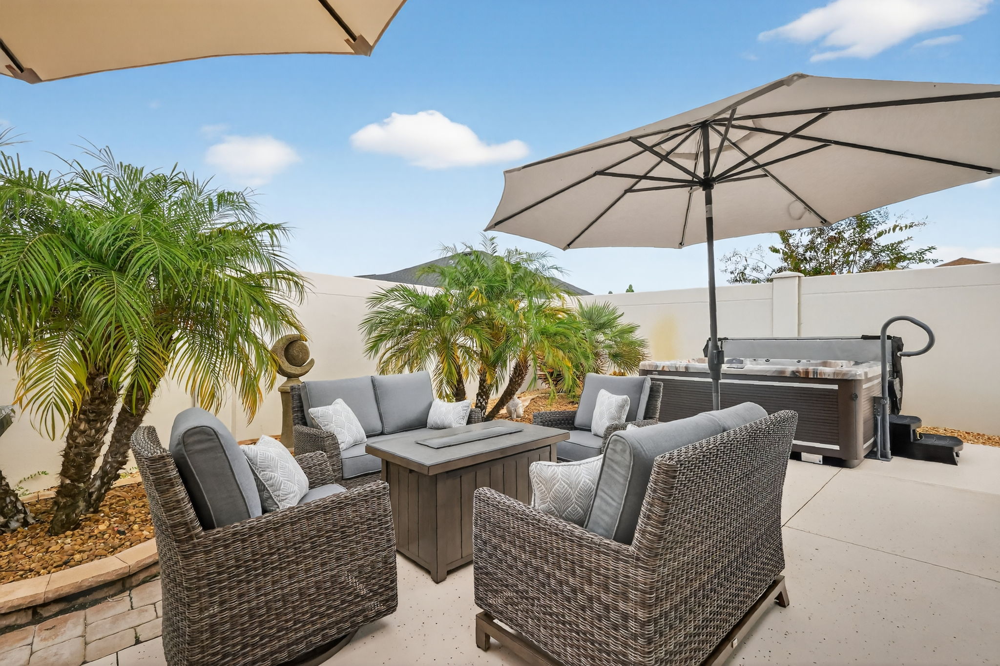 Rear Courtyard with Sitting Area, Hot Tub, and Grilling Kitchen