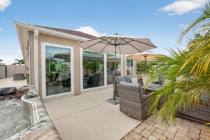 Rear Courtyard with Sitting Area, Hot Tub, and Grilling Kitchen