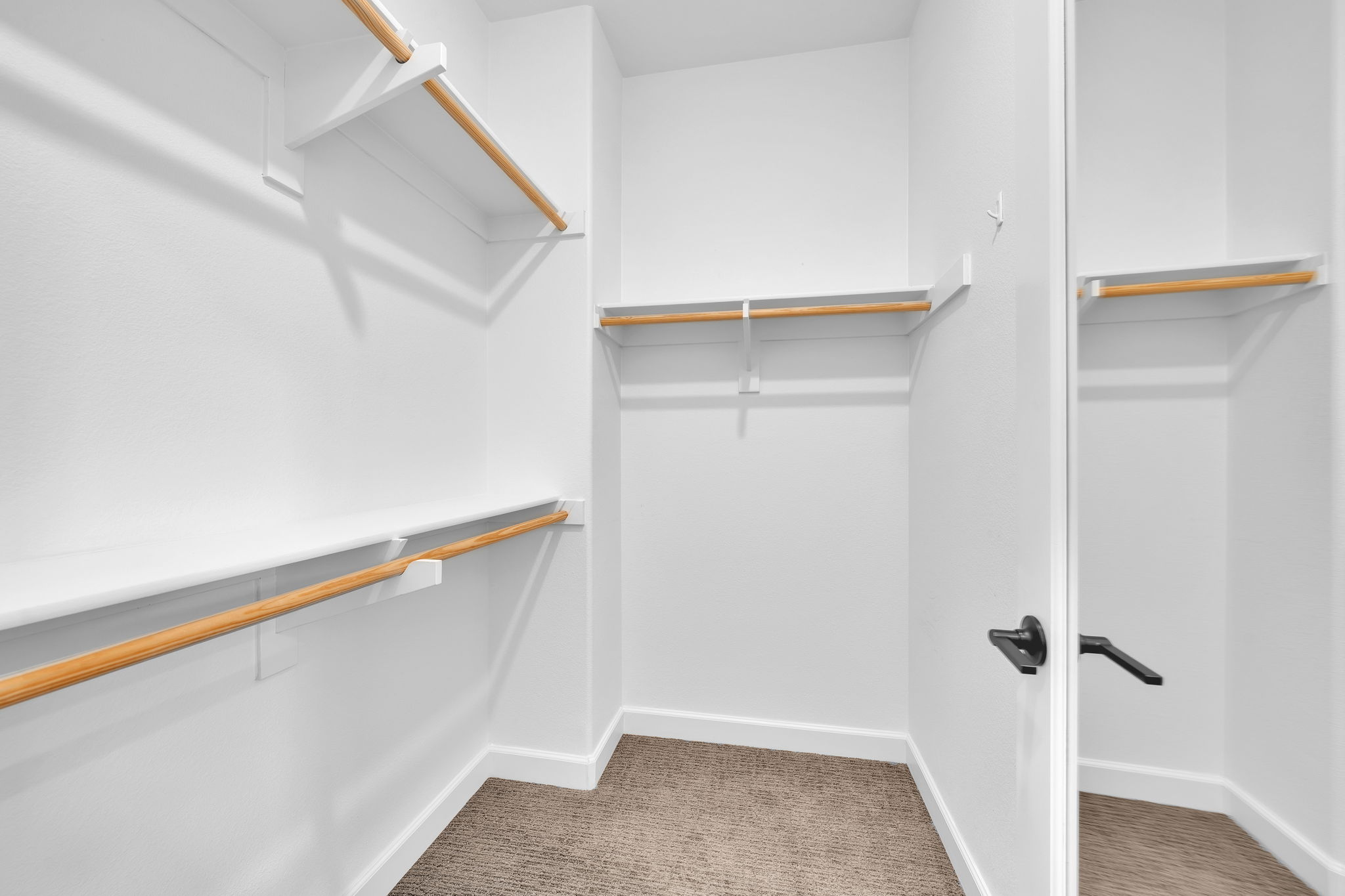 1 of 2 Primary Walk in Closets