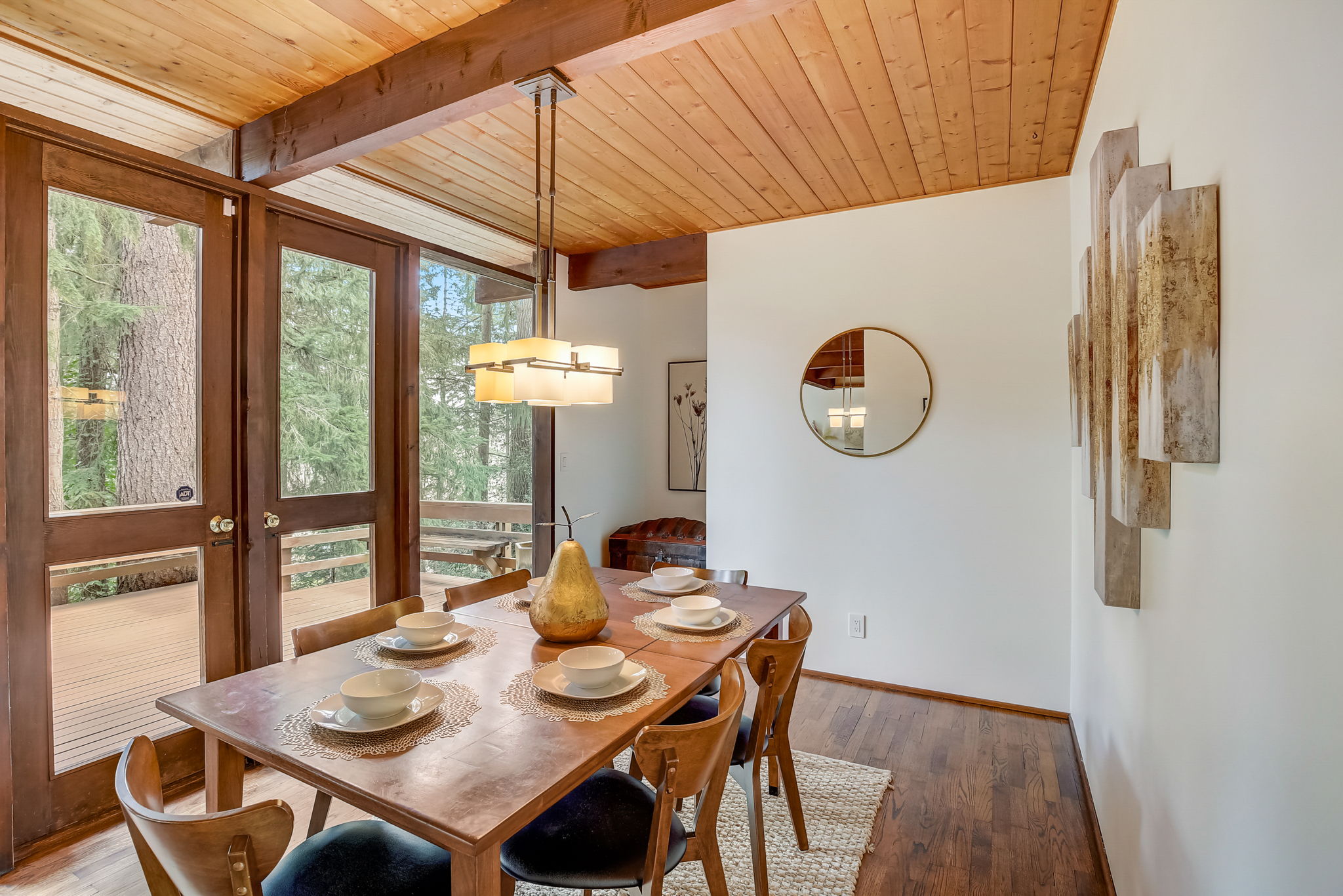 Formal dining with french doors to private deck
