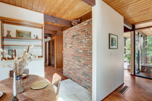 View from the breakfast Nook of back fireplace