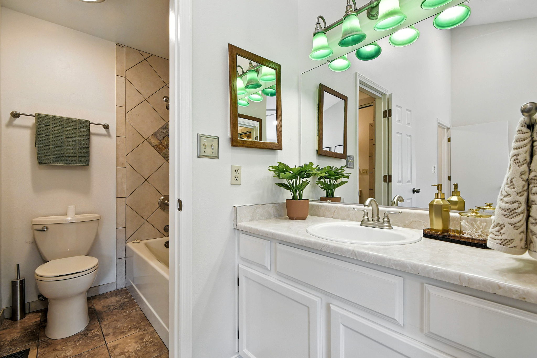 Bathroom with tub and shower and additional sink