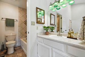 Bathroom with tub and shower and additional sink