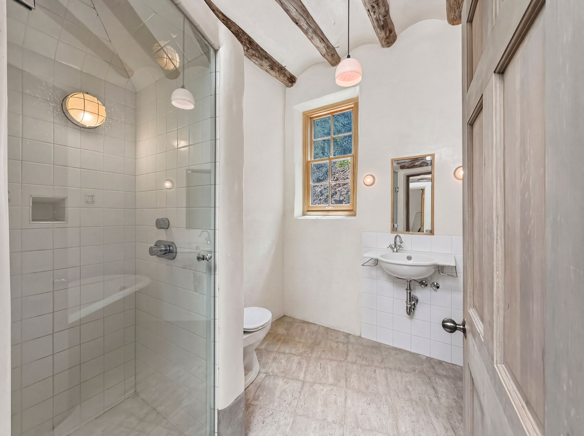 Full Bathroom + Claw-Foot Tub located by the Sunroom and Great Room.