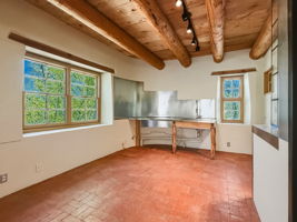 Versatile open-plan space with sink, ready to transform to suit your vision.