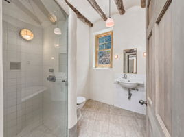 Full Bathroom + Claw-Foot Tub located by the Sunroom and Great Room.
