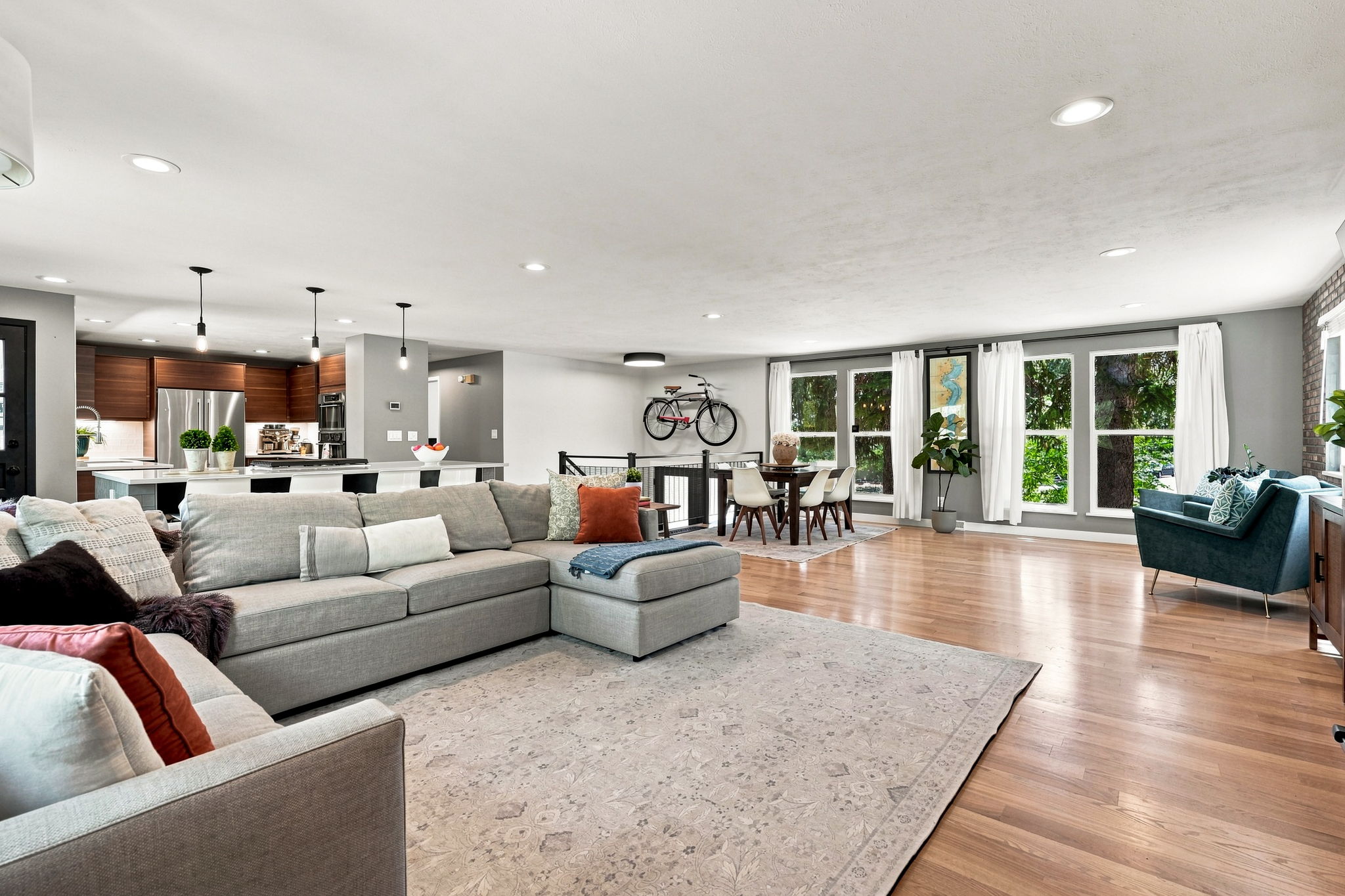 Warm hardwood floors run the length of the main level.