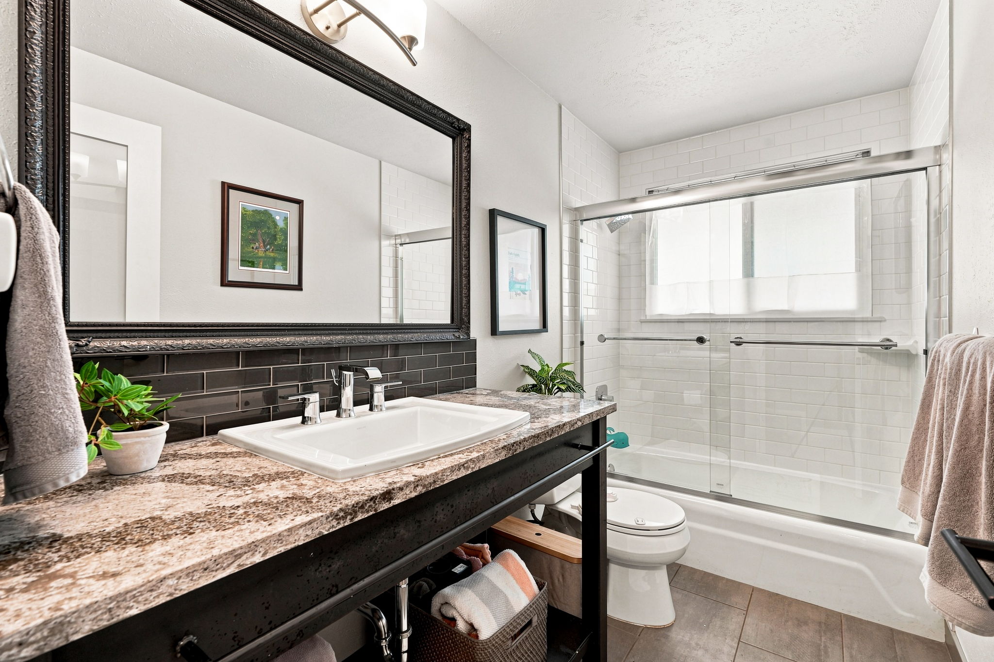 Second full bath upstairs with tub and shower.