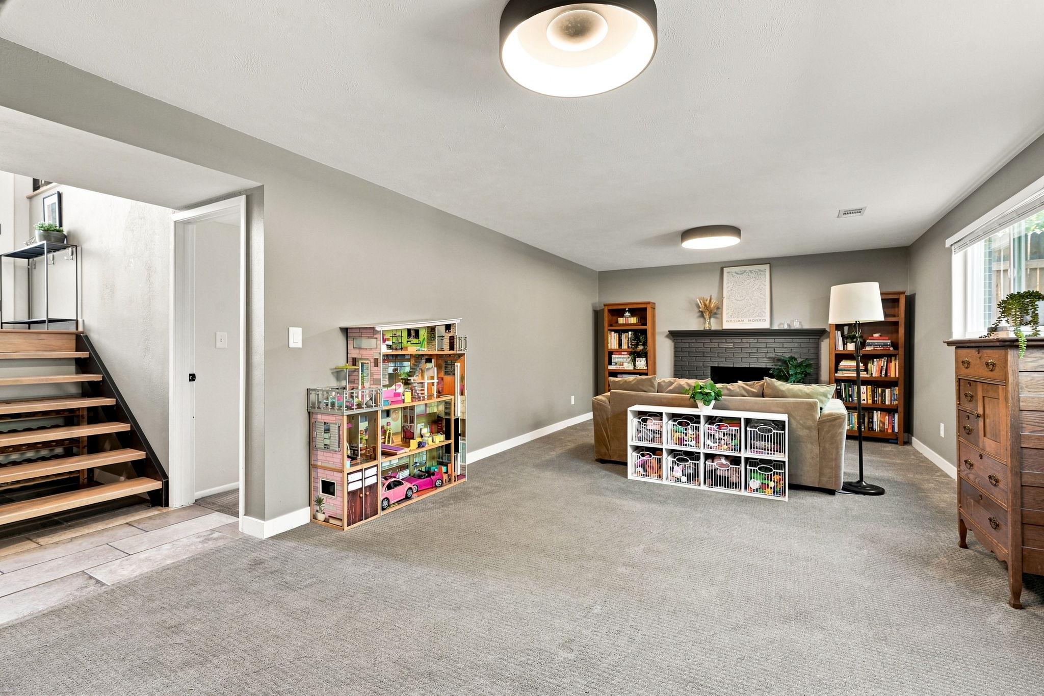 Spacious lower-level family room with daylight windows.