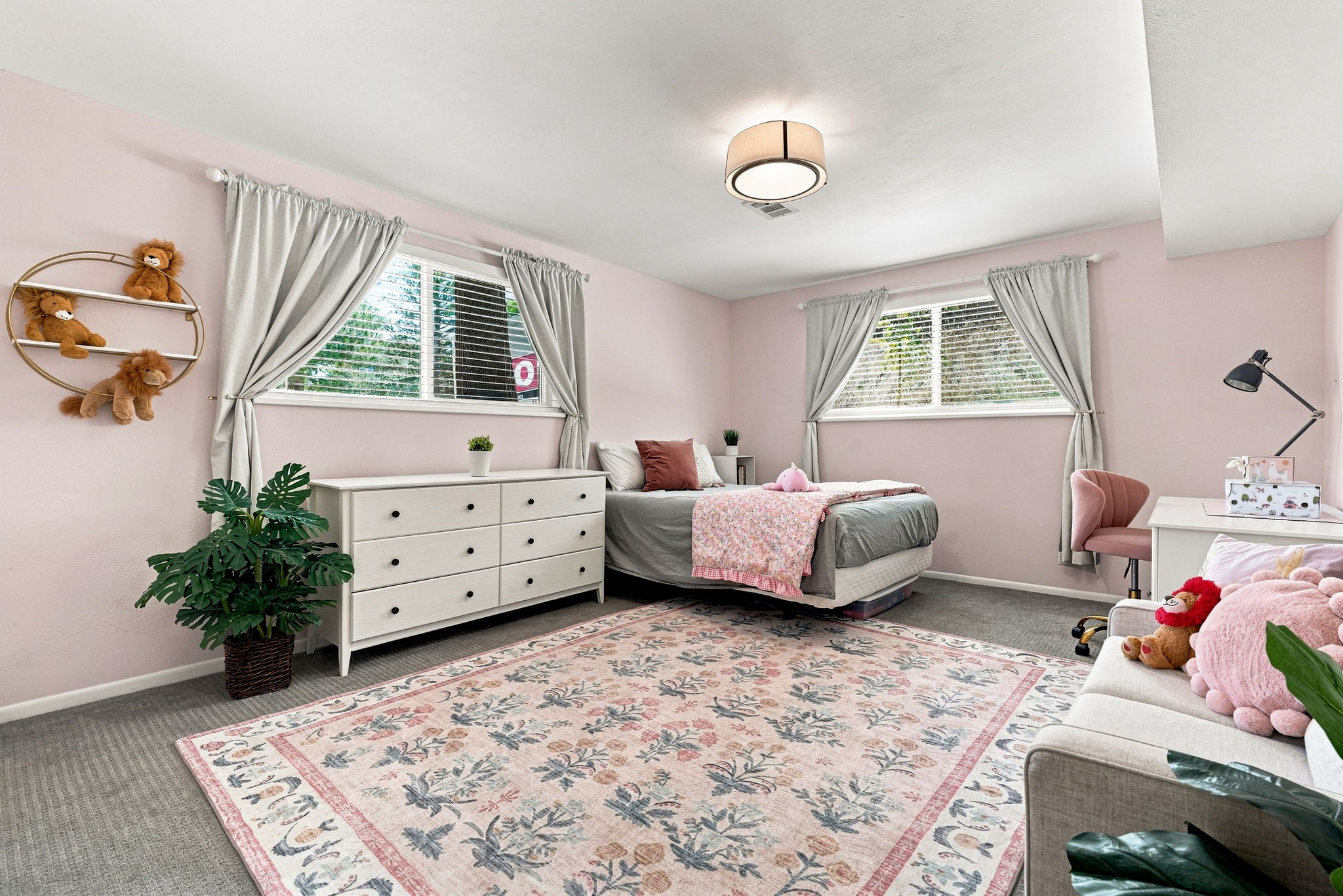 Fourth bedroom on the lower level, bright and generously sized.