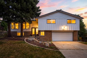Renovated 4-bedroom at the base of Lookout Mountain, glowing at sunset.