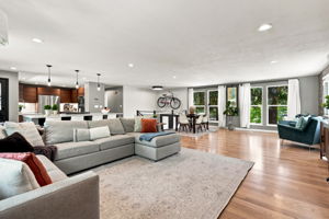 Warm hardwood floors run the length of the main level.